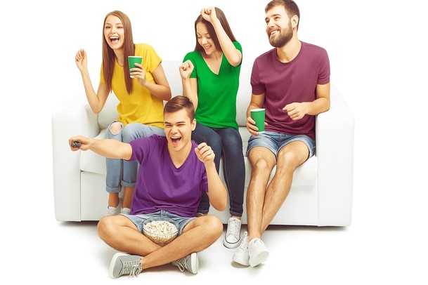 Family enjoying OllaStream IPTV service